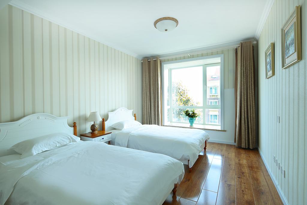 Qingdao Oceanside Hotel & Resort الغرفة الصورة